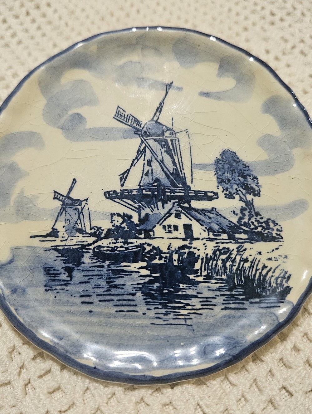 Vintage Delft Blue decorative plate a classic Dutch windmill scene hand-painted